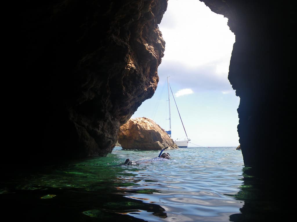 Snorkeling through caves in the BVI, Norman Island. Popular Snorkeling spot The Caves.