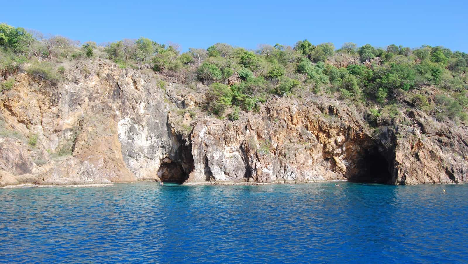 Island water caves at Norman Island, popular charter snorkel destination